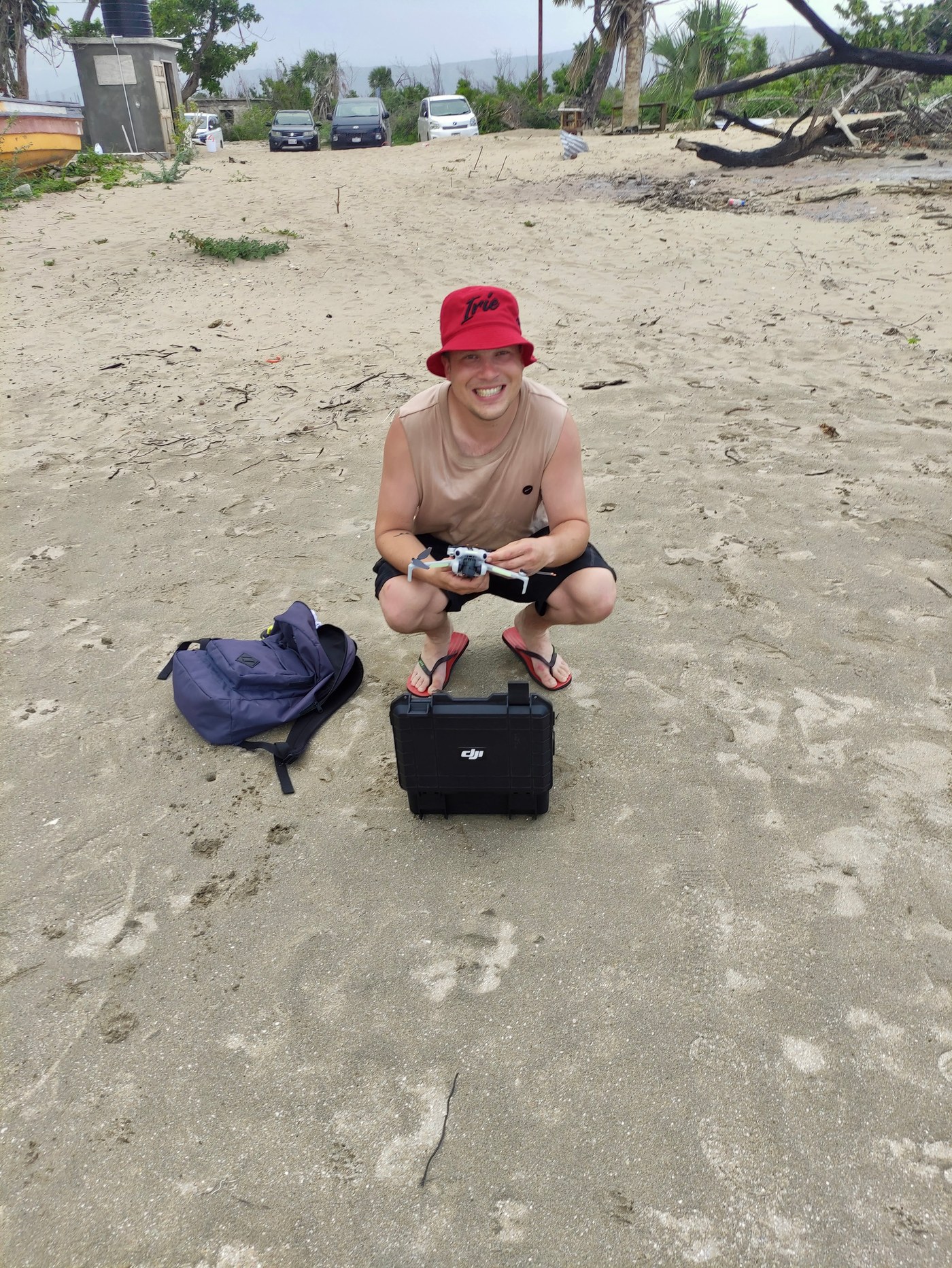 Your guide on the beach with the drone he films the trip with