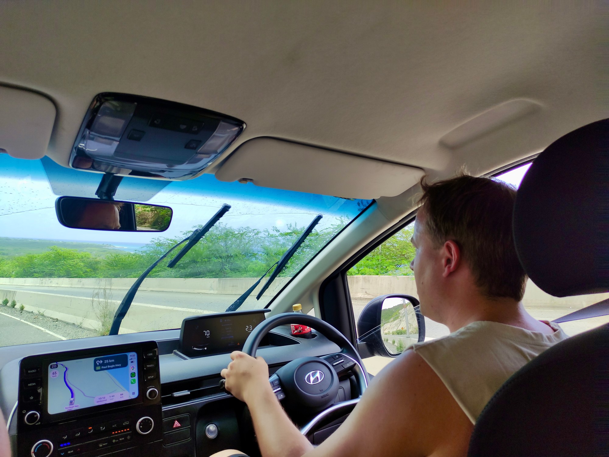 Your guide driving the minibus on the coast road