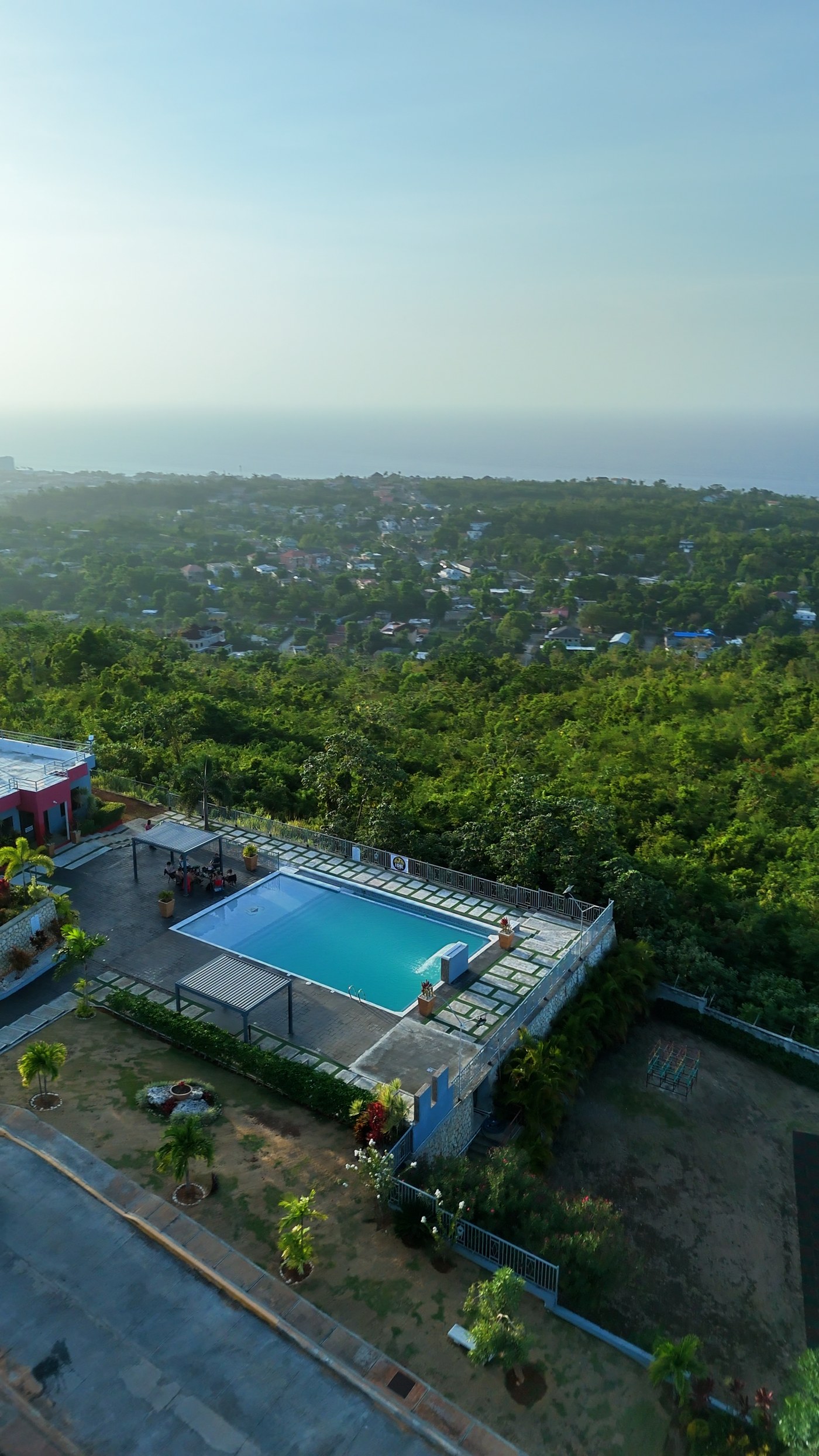 Hillside pool looking out over Ocho Rios and the sea
